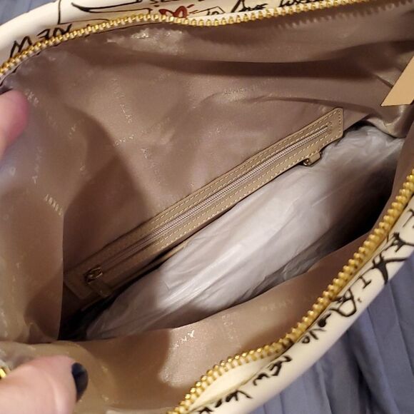 DKNY Tilly graffiti print  backpack in cream w/graffiti print, new with tags! - Picture 12 of 14